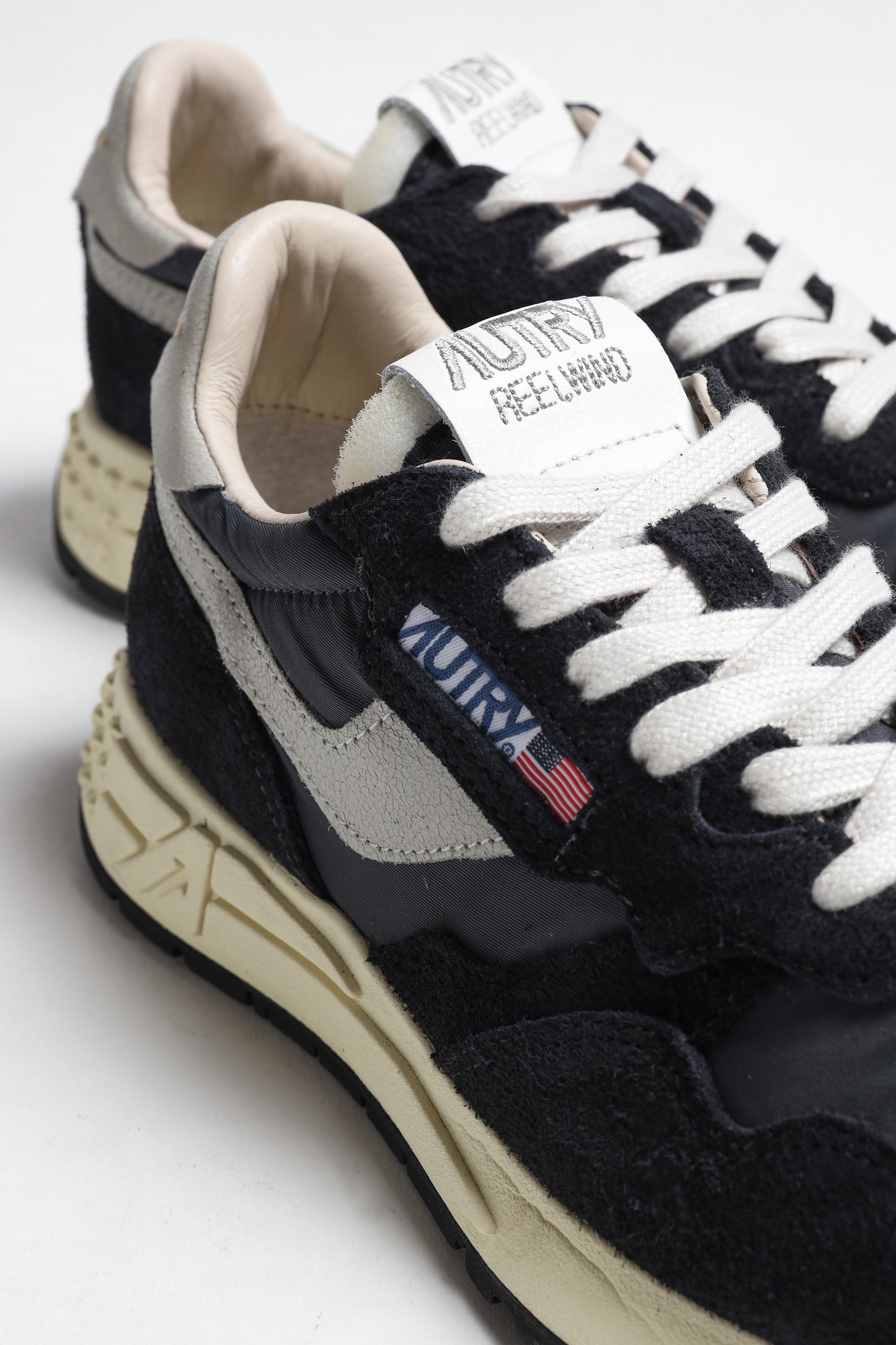 Sneaker Reelwind in Crack White/Black Autry