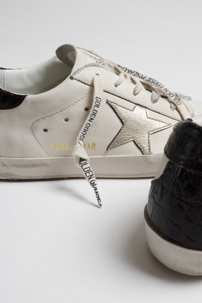 Sneaker Super Star in White/Platinum/BurgundyGolden Goose - Anita Hass
