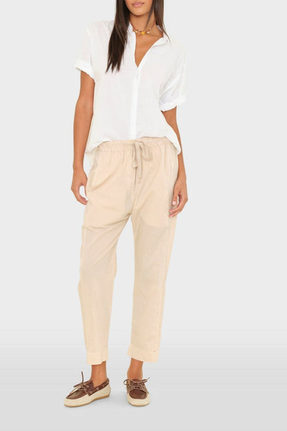 Pantalones draper en pergamino