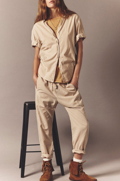 Pantalones draper en pergamino