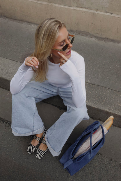 Línea de manga larga en blanco