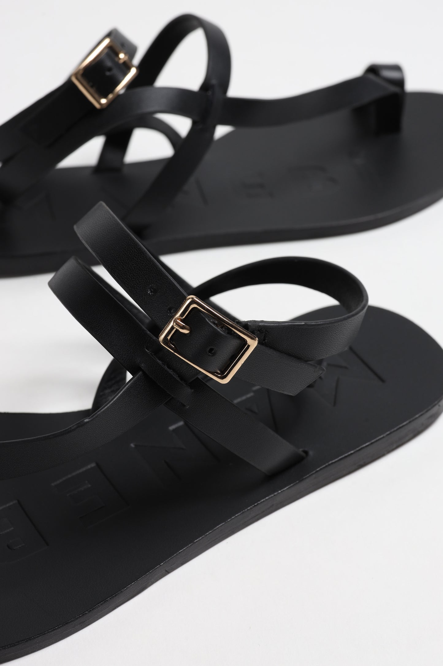 Toeloop Sandals in Black by Manebi - Anita Hass