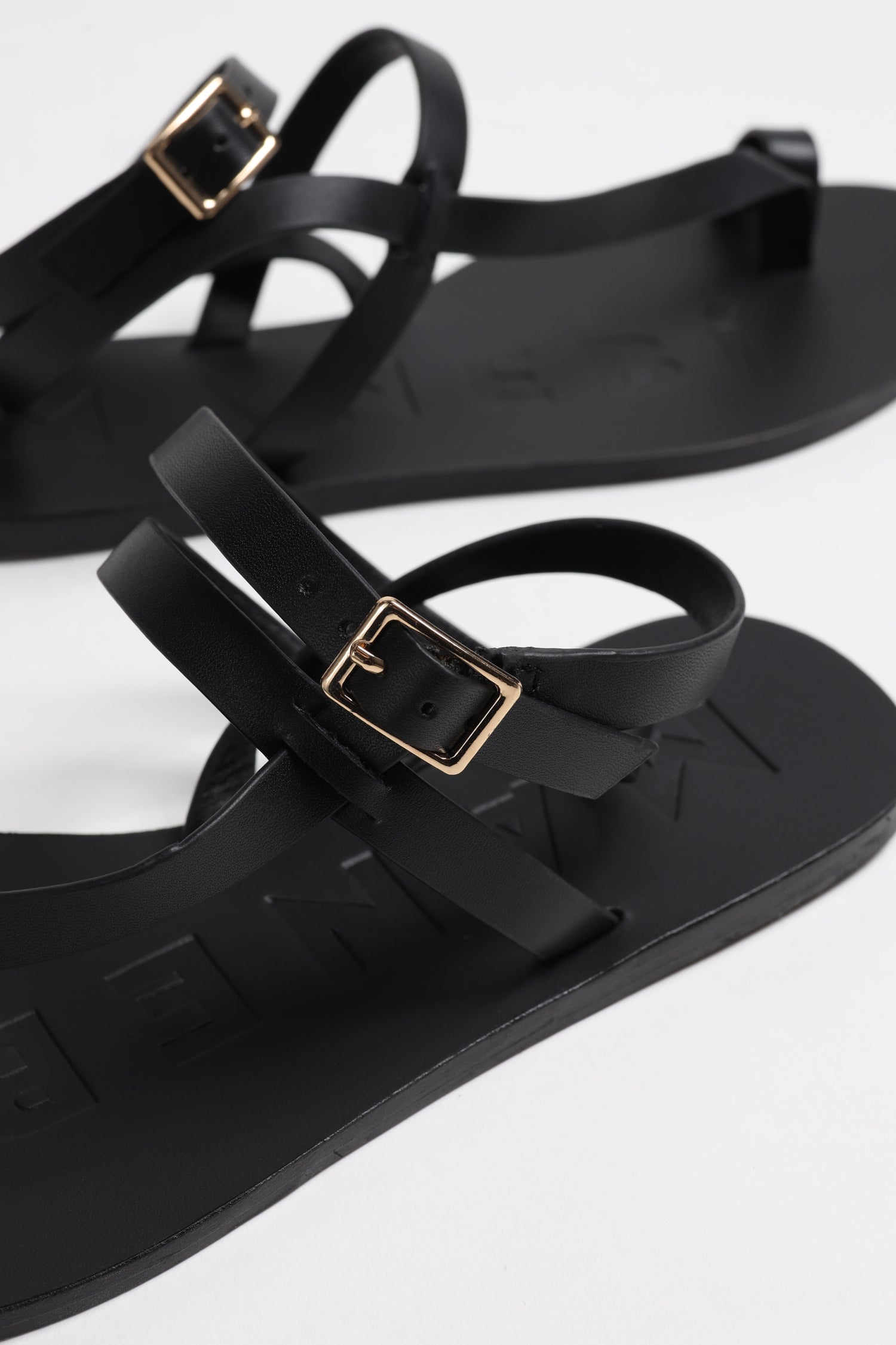 Toeloop Sandals in Black by Manebi - Anita Hass