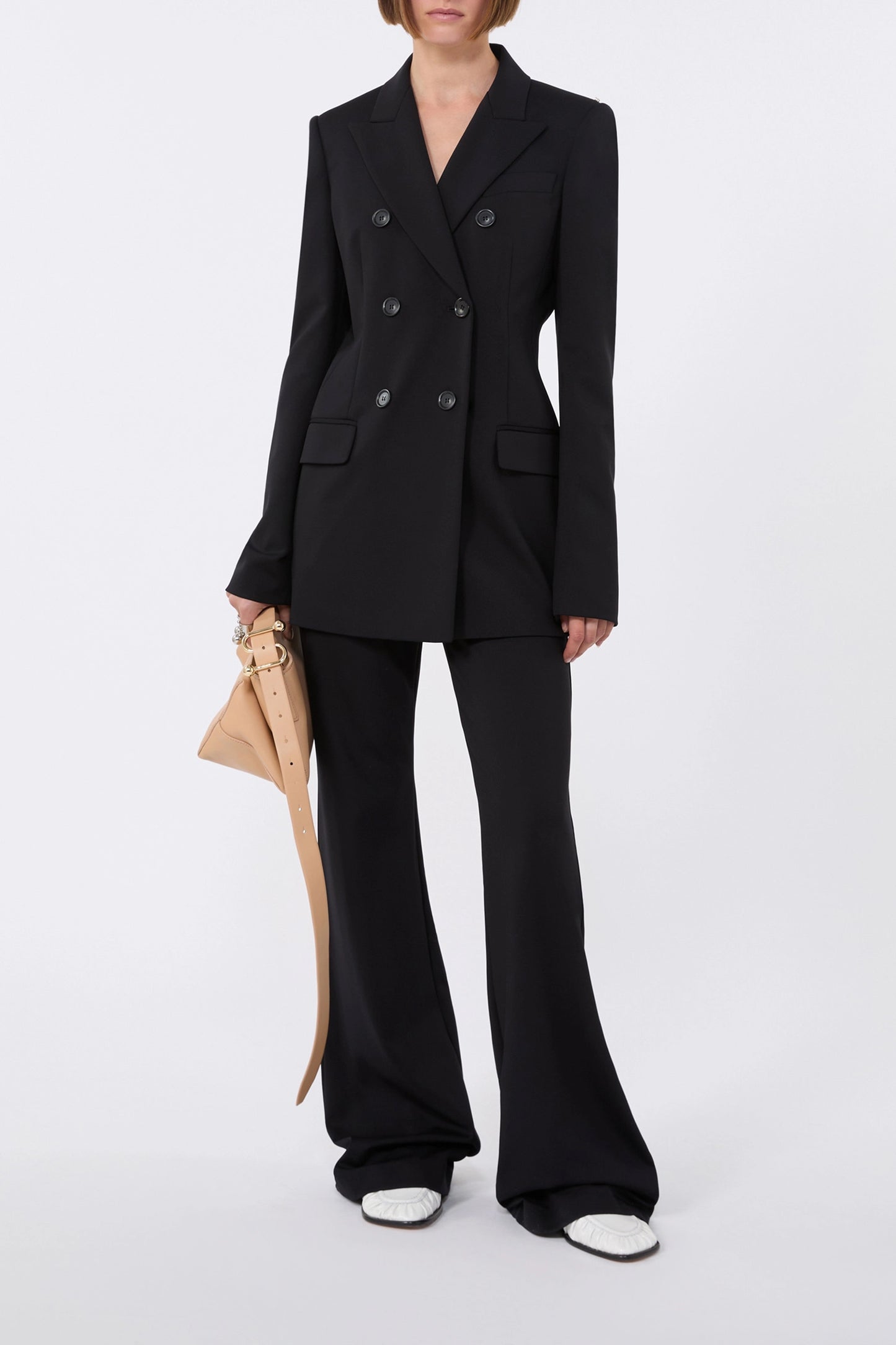 Gettone Flared trousers in black