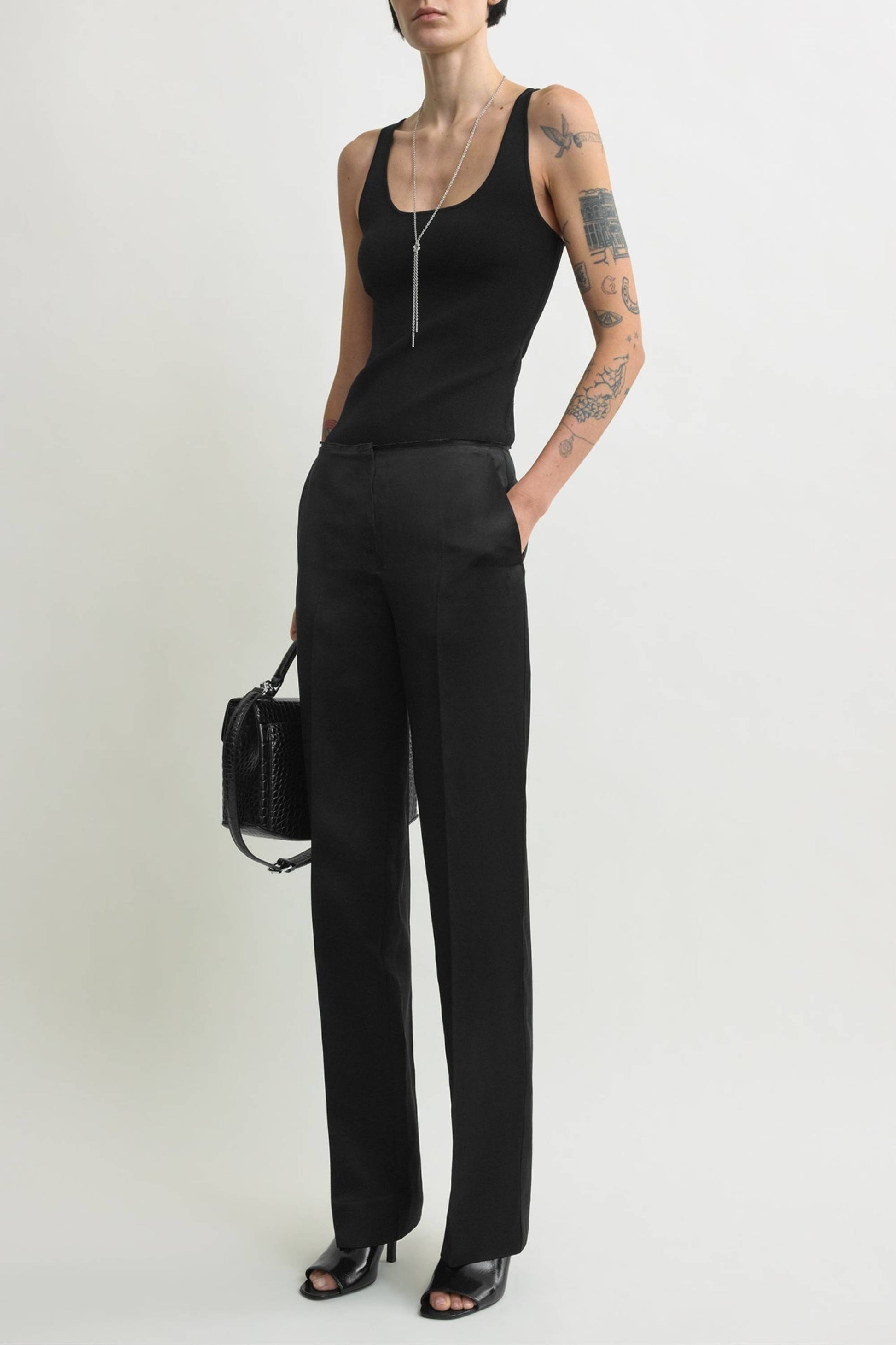 Easy Raw Edge Pants in Black by Toteme - Anita Hass