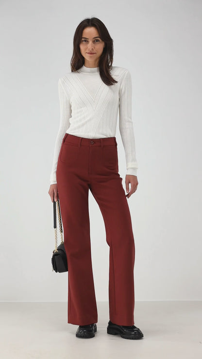 Flared trousers in red brown